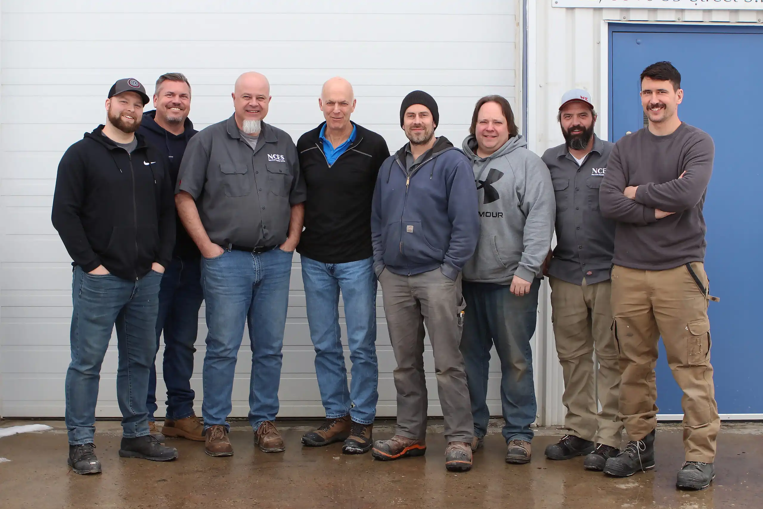 The Nose Creek Electrical Services crew outside the Starfield Industrial shop
