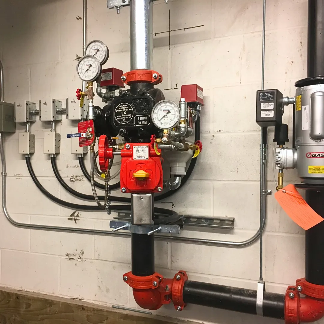 Sprinkler riser supervisory switches and gauges wired for fire alarm monitoring