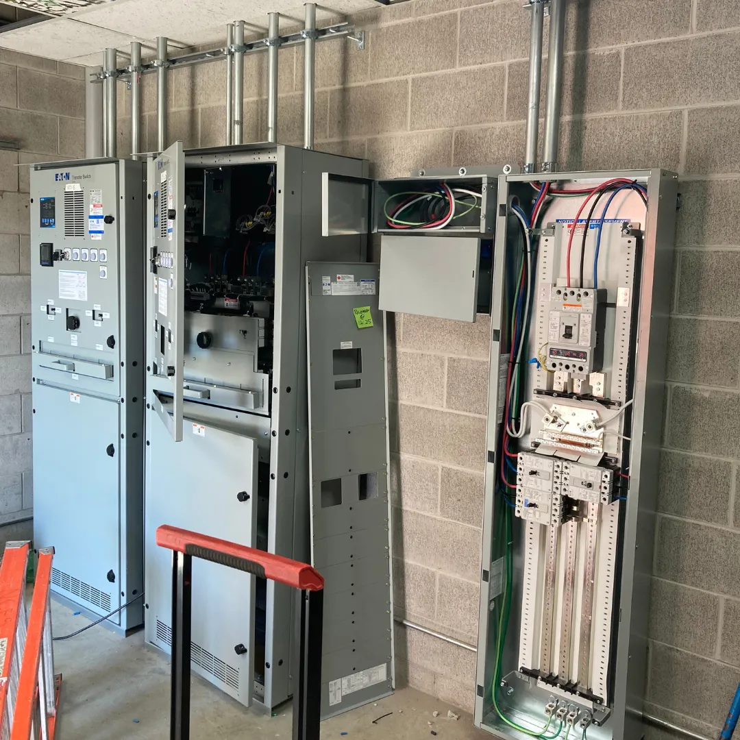 Emergency back-up switchgear installation in an electrical room